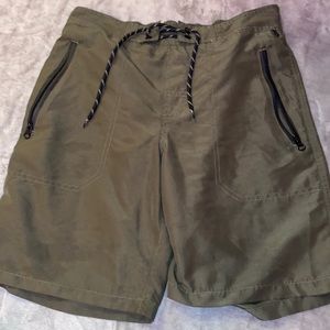Olive green knee length board shorts. Men's small. Good for waist size 26-29.